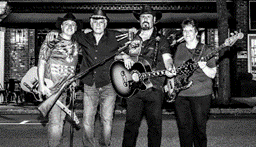 Roadkill Country Outlaws Band musicians holding instruments